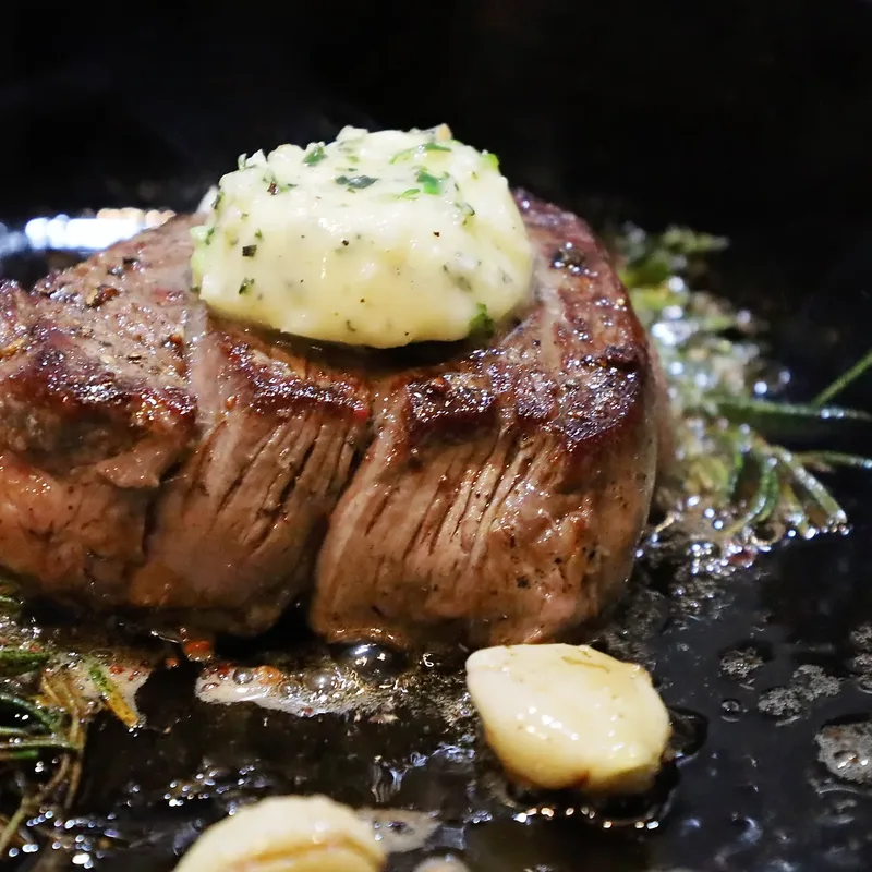 Filet finished in the pan with garlic and rosemary